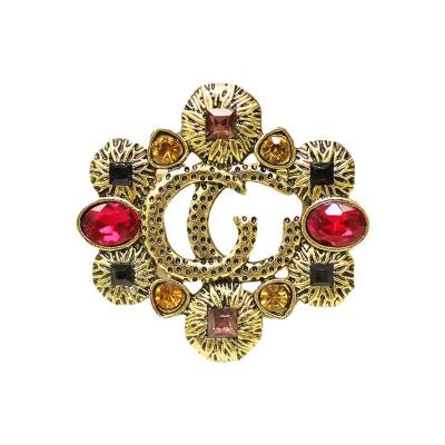 China 2023 fashion cc good designer jewelry metal brand logo elegant custom luxury women brooches and pins for sale