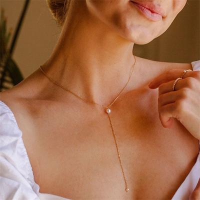 China Elegant Vintage 14K Gold Plated Freshwater Pearl Necklace For Mother Valentine Y Shape Clavicle Stainless Steel Pearl Necklace for sale