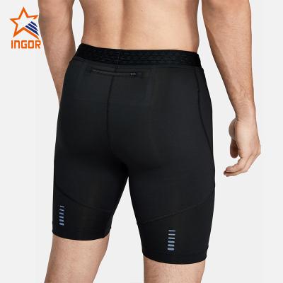 China Antibacterial Custom Mens Sports Wear Elastic Band Mens Fitness Compression Running Shorts With Pouch for sale