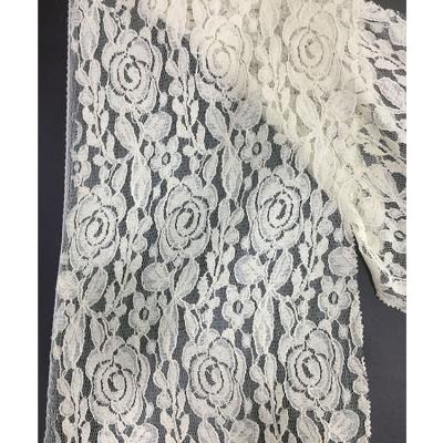 China 100% Sustainable Nylon And Cotton White Black Warp Knitted Floral Lace Fabric For Dress for sale