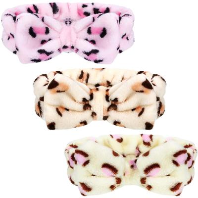 China Korean Fashion Bow Microfiber Spotted Leopard Head Tape Makeup Spa Shower Hair Band for sale