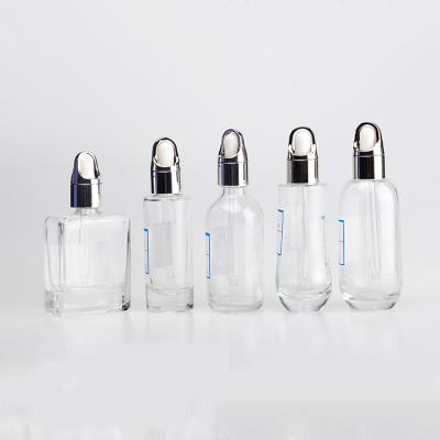 China Wholesale 20ml Clear Empty Cosmetic Clear Dropper Bottle Garment Sliver Cap Glass Bottle Sliver Dropper Bottle Cap Dropper for sale