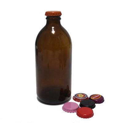 China Garment Beverage Storage 330ml 500ml Amber Glass Bottle With Crown Cap For Ginger Beer for sale