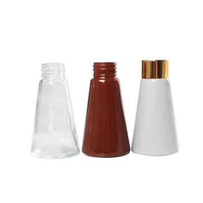 China Garment Reed Diffuser Glass Bottle Empty Bottle With Lid for sale