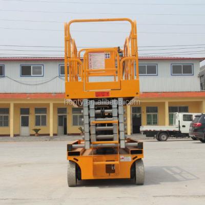 China Manufacture 10m 12m Low Noise Electric Self Propelled Mobile Scaffolding Scissor Lift Platform for sale