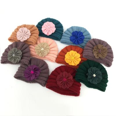 China Fashion Baby Winter Warm Soft Knit Hat Babies Toddler Turban Knit Beanie Hat With Flowers for sale