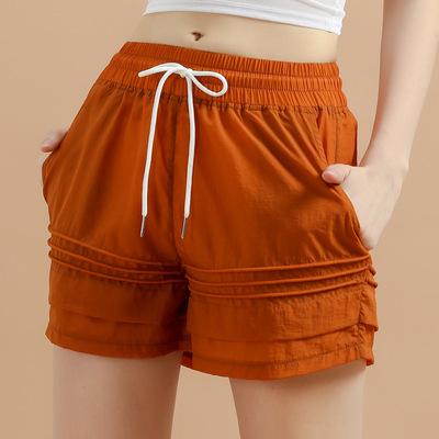 China Breathable Workout Yoga Fitness Women Sports Gym Booty Shorts With Pocket for sale