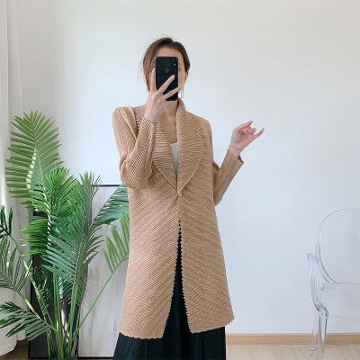 China 2022 FXZ QUICK DRY miyake pleated coat fashion design spring long new over waist lapel pleats women cardigan for sale