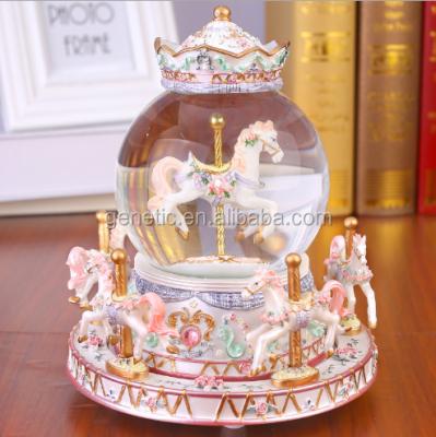 China Asia Rotate Musical Spinning Snow Globe With LED Light For Christmas Gift Birthday Gift for sale