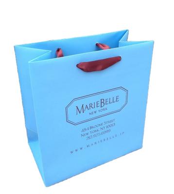 China Biodegradable Custom Embossed Printing Matt Laminated Paper Bag With Embossment for sale