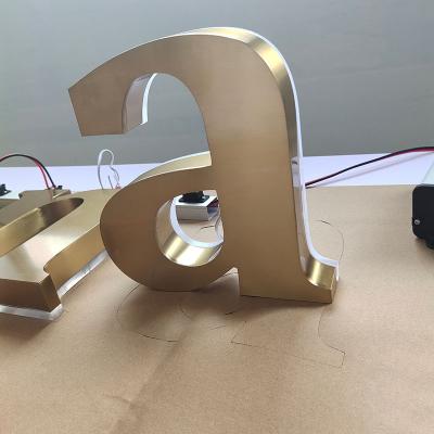 China Elegant Styles Elegant Styles Custom Laser Cutting Backlit Channel Letters Making Advertising 3D Golden Solid Brushed Stainless Steel Letters for sale