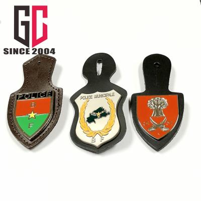 China Custom Europe 12 Factory Metal Military Badge With PU Leather Backing for sale