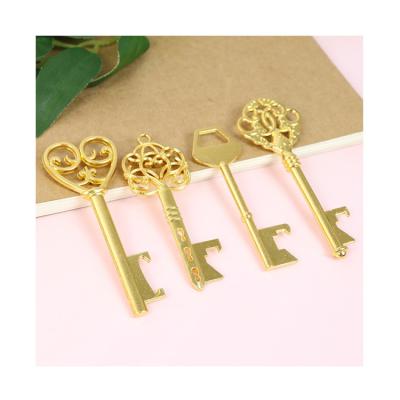 China Wedding Cheap Modern Custom Keychain Logo Bottle Opener Golden Bottle Holder Key Opener for sale