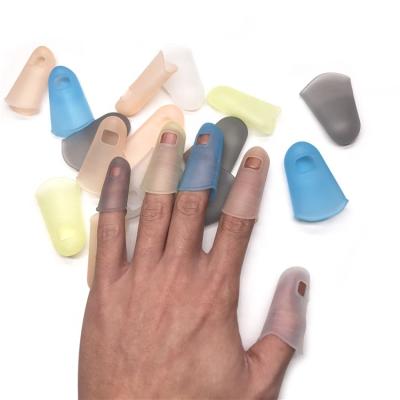 China Hot Selling Anti-slip Soft Reusable Silicone Gummed Finger Cradles For Protect Finger for sale