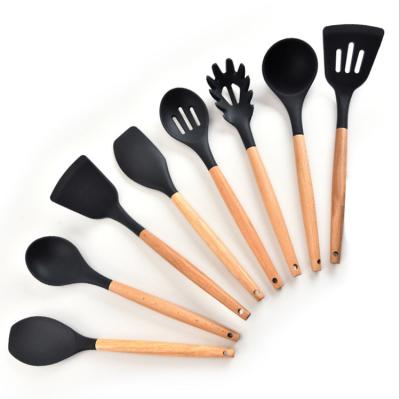 China Viable wholesale kitchen accessories set wooden handle non stick silicone kitchen cookware utensil set for sale