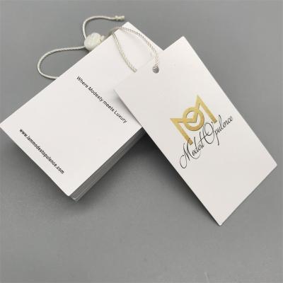 China Eco-friendly Fashion Logo OEM Designer Paper Labels Recyclable Customer Brand Custom Garment Hang Tags for sale