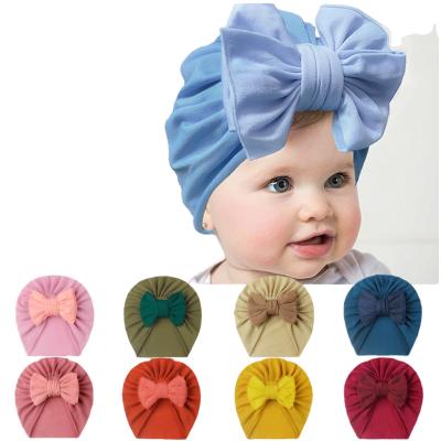 China New European and American style baby hat children's hat baby pure color bow and knotted sleeve hat Indian hatturban hat for sale