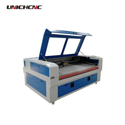 China Laser CUT petticoat clothing home fabric laser cutting machine for sale