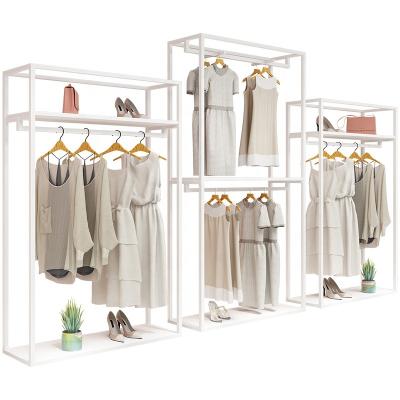 China Modern Stylish High End Clothes Store Showroom Display Wall Mounted Clothes Rack Design Clothes Display Rack for sale