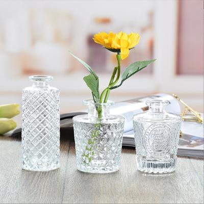 China Eco-friendly Nordic glass vase flower vase creative tabletop cool hydroponic glass bottle small for home decoration for sale