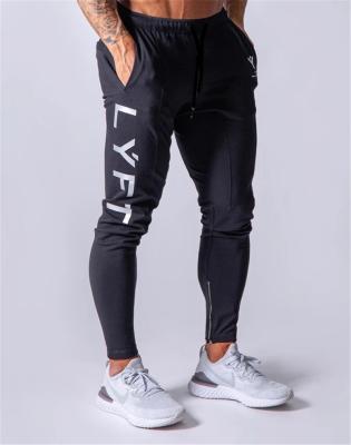 China Anti-Wrinkle 2022 100% Cotton New Design Sweatpants Custom Logo Loose Drawstring Pure Color Casual Exercise Gyms Plus Size Men's Trousers for sale