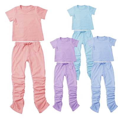 China Hot Sale Casual Summer Kids Clothing Sets Solid Shorts Shorts Daily Life Unisex 100% Cotton Baby Stacked Jogger Pants for sale