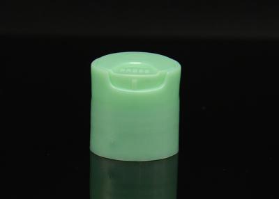 China Green matte press / disc cosmetic caps for PE / PET bottles with printing for sale