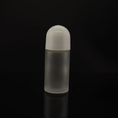 China 50ml Fogging Glass Roll On Deodorant Empty Bottle With PP Cap And Holder for sale