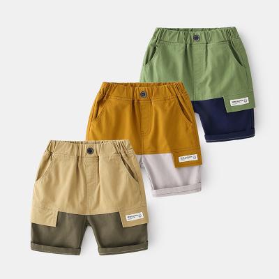 China 2022 summer new boy's anti-pilling contrast color pungent beach shorts fashionable cotton casual shorts for sale