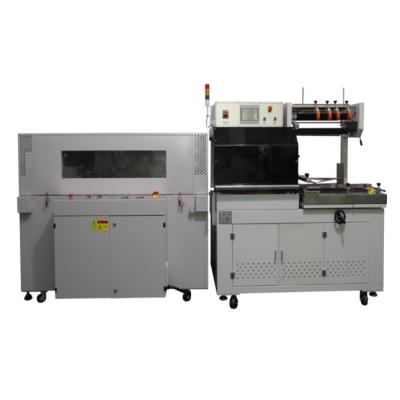 China High Quality Automatic Food Seal Shrink Packaging Machine Wrapping Machine for sale