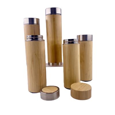 China Custom Steel Business Tumbler Insulated Thermoses Vacuum Steel Bamboo Flask With Removable Tea Infuser for sale