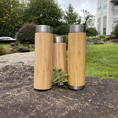 China Business Success Tumbler Insulated Thermoses Vacuum Steel Bamboo Flask With Removable Tea Infuser for sale