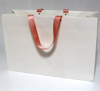 China Boutique Brand Recyclable Paper Bag With Fine Rope Handle Printing Custom Shopping Paper Bags With Your Own Logo For Clothes Shoes for sale