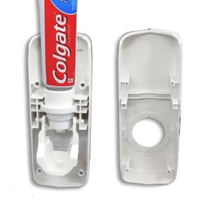 China Good Quality Sustainable Portable Automatic New Hand Free Toothpaste Dispenser for sale