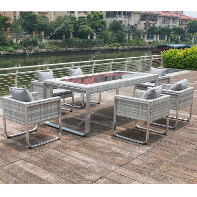 China Weather Resistant Rattan Dining Set Outdoor Furniture Outdoor 8 Seat Dining Sets Garden Table Set for sale