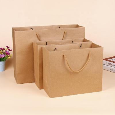 China Custom Recycled Logo Clothing Shopping Packaging Paper Gift Bag High Quality Recyclable Paper Bags Brown Materials Kraft Paper for sale