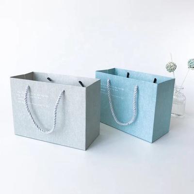 China Recycled Materials Wholesale Custom Paper Gift Bags Shopping Paper Bag With Logo For Packaging Shop for sale