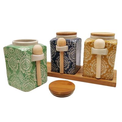 China Ceramic Cover Kitchen Storage Airtight Bottles Canister With Wooden Lid / Spoon Bamboo for sale