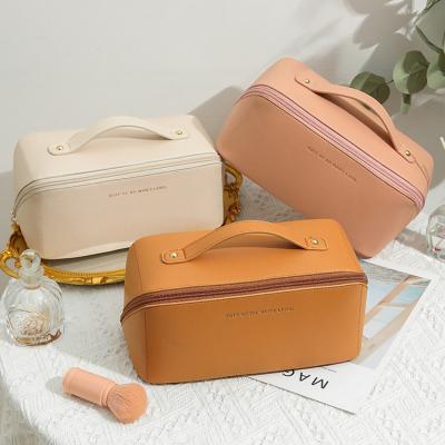 China Custom Travel Cosmetic Organizer Makeup Pouch Bag Fashion Logo Leather Toiletry Bag for sale