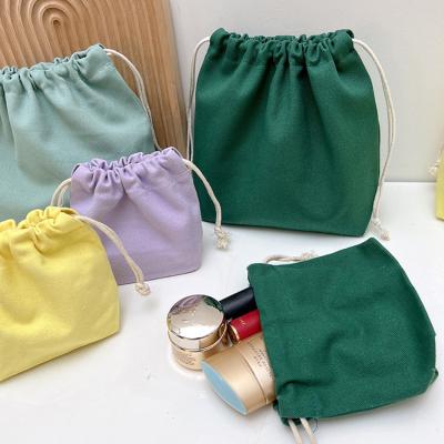 China New Design Dust Proof Drawstring Storage Makeup Bag Canvas Handled Makeup Pouches Women Travel Cosmetic Bags for sale