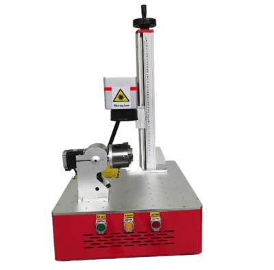 China Laser Marking Top Grade Tag Fiber Laser Marking Machine Flat Bed For Stone for sale