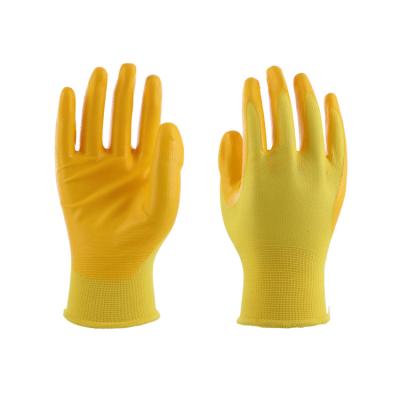 China Wearable comfort; CE 13G Wet And Oily Yellow Coating Environmental Guantes Good Yellow Nitrile Grip Coated Anti Abrasion Anti Slip Work Protective Gloves for sale