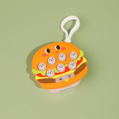 China Cute Hamburger mini game console ground mouse decompression toy children's clearance speed push machine keychain pendant for sale