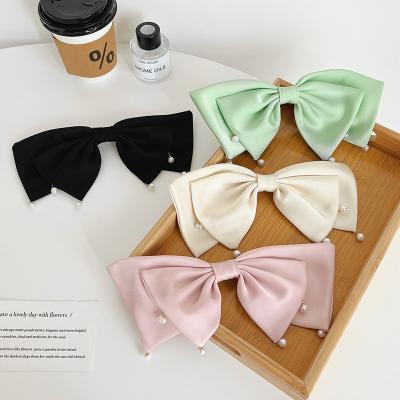 China New Environmentally Friendly Korean Style Cloth Bowknot Spring Clip Simple Solid Color Pearl Hair Clips For Girls for sale