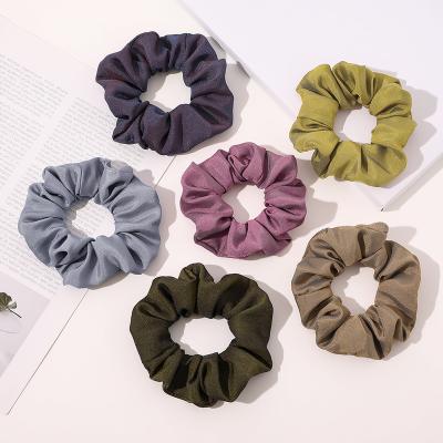 China Hot Selling Environmentally Friendly Ins Cloth Snap Hair Ties Simple Fashion Large Elastic Scrunchies For Women for sale