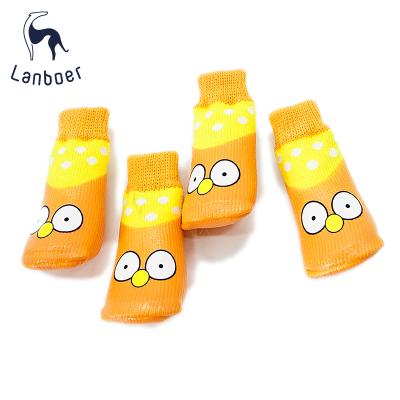 China Lanboer Sustainable Pet Fashion Dog Shoes Waterproof Socks Friendly Rubber Anti Slip Cheap Rise Cartoon Printing for sale