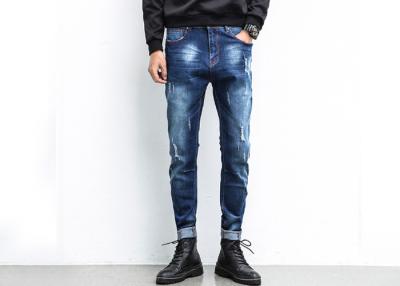 China Innovative Ripped Men'S Denim Jeans Plain Dyed With Button Fly Closure for sale