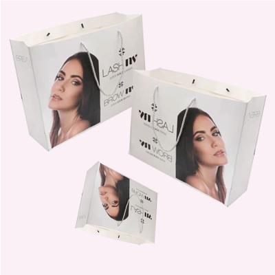 China Recycled White Paper Tote Bags Women's Recycled Paper Packaging Custom Logo Printing Materials Monbile Gift Shopping Bag Phones Bag for sale