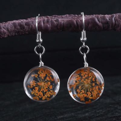 China 2021New CLASSIC Japanese and Korean fresh temperament flower crystal ball handmade natural dry earrings for sale