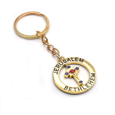 China 2021 Metal Gift Rotating Cross Key Chain Pendant Gift Golden Ring Jewelry Religious Church Relic for sale